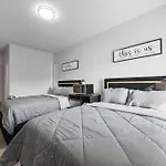 Modern 2024 Townhome With Indoor Hoops Huge Tvs And Gray Chic Design