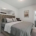 Modern 2024 Townhome With Indoor Hoops Huge Tvs And Gray Chic Design