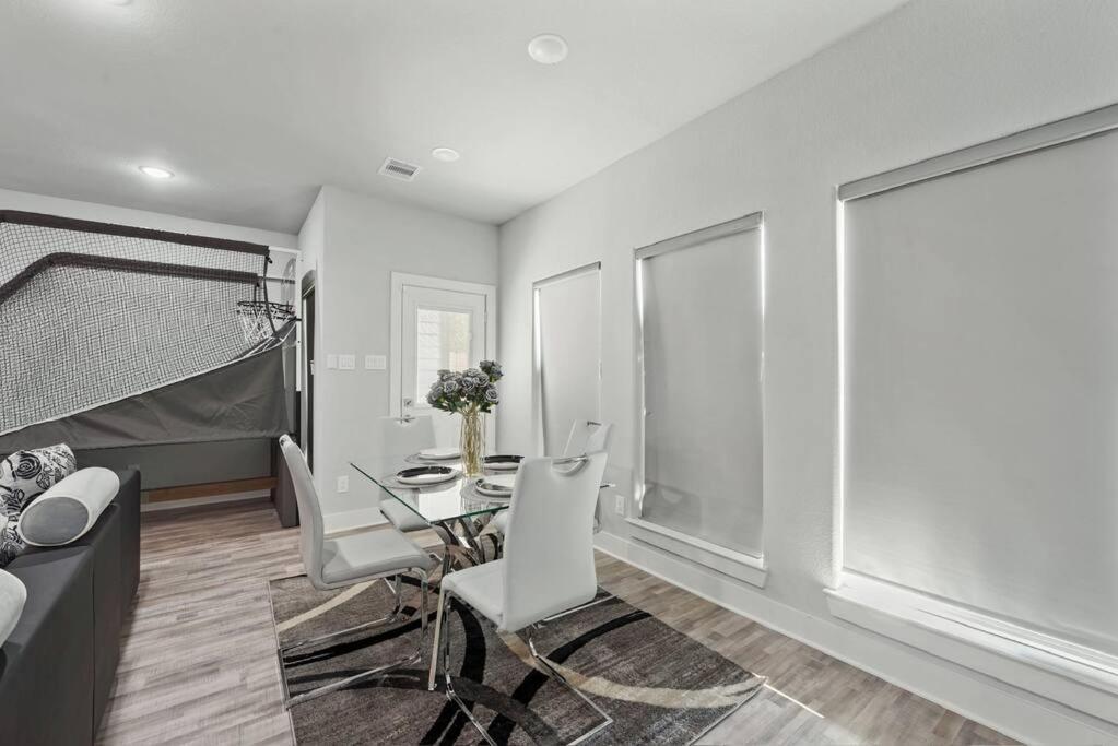 Modern 2024 Townhome With Indoor Hoops Huge Tvs And Gray Chic Design