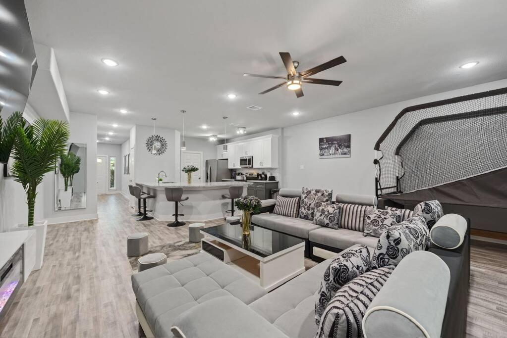 Holiday home Modern 2024 Townhome With Indoor Hoops Huge Tvs And Gray Chic Design