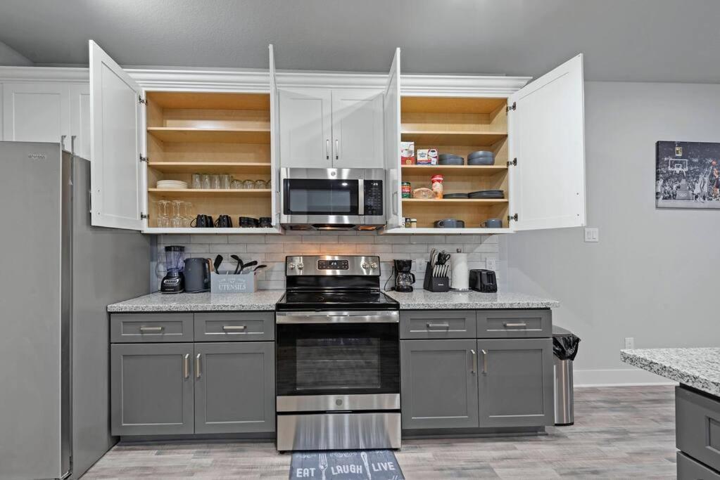Modern 2024 Townhome With Indoor Hoops Huge Tvs And Gray Chic Design Houston