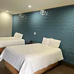 The Symphony Inn & Suites