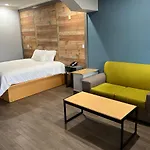 The Symphony Inn & Suites